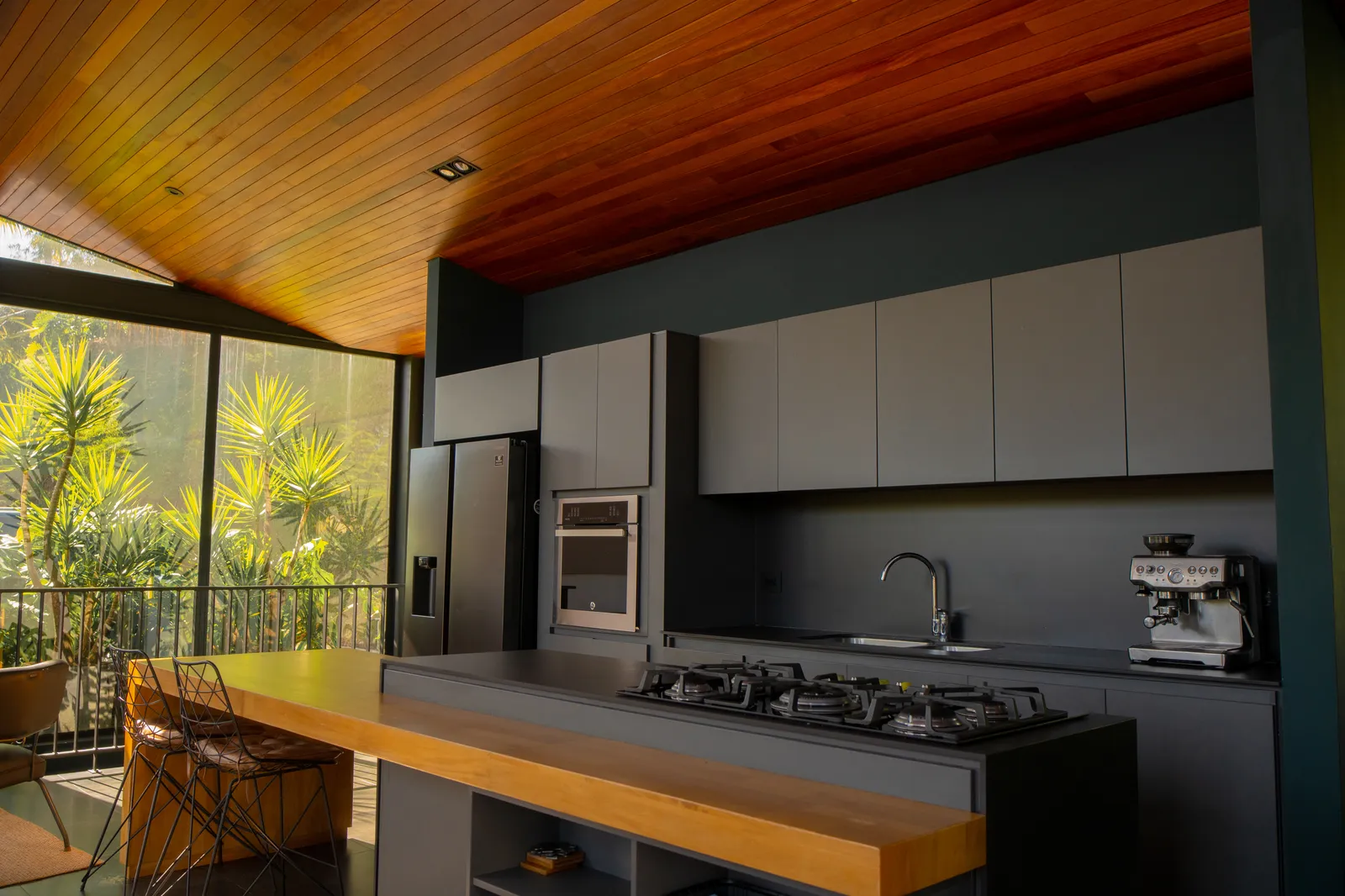 Modern kitchen with island and lake view